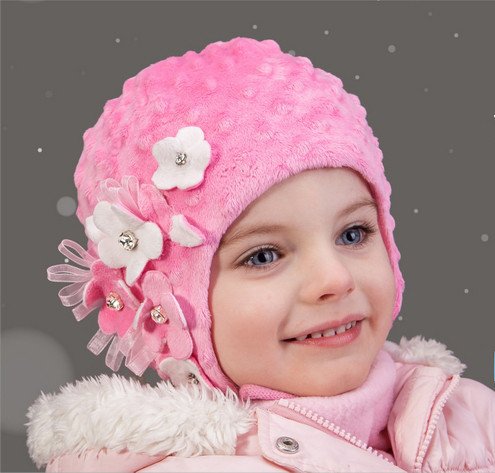 Фото - зимова шапочка Квіточки для дівчинки ціна 110 грн. за штуку - Леопольд